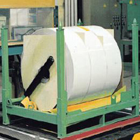 Coil containers with stacking function and forklift pockets
