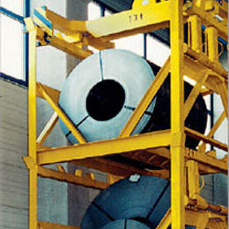 Stackable coil container with adapter crossbar and tilt protection