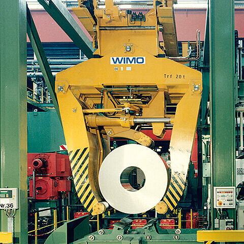 Automatic coil removal system from the rewinder Automatic coil removal system from the rewinder