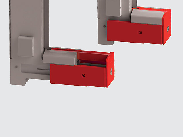 Ausfahrbare Aufnahmepratzen zum Transport mehrer Spaltbänder Ausfahrbare Aufnahmepratzen zum Transport mehrer Spaltbänder