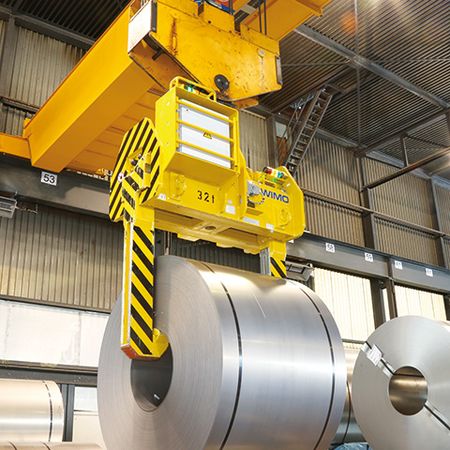 Telescopic coil tong with spindle drive Telescopic coil tong with spindle drive